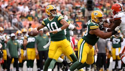 Love throws long TD on 3rd play as Packers down Browns