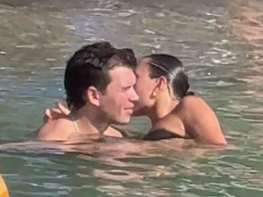 Luke Newton Packs on the PDA with Rumored Girlfriend Antonia Roumelioti During Italian Vacation