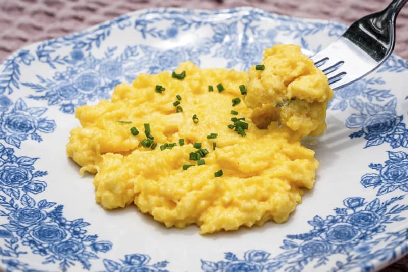 Chrissy Teigen’s Brilliant Trick for “Creamy” Slow-Cooked Scrambled Eggs