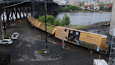 Drone footage reveals extent of Steel Bridge train derailment