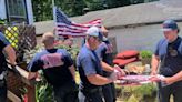 Upstate firefighters replace tattered American flag for disabled veteran