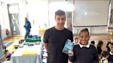 Award-winning author surprises pupils during school visit