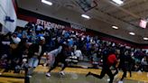 Rockford basketball game abruptly ends after fans flee in panic. Here's what happened