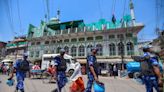 Mosques covered with sheets on Holi procession route in India