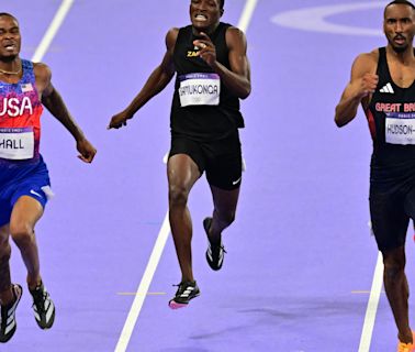 USA's Quincy Hall passes 3 runners in final stretch to win gold medal in Olympic 400 meters