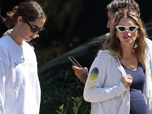 Katherine Schwarzenegger bumps along on outing with sister Christina