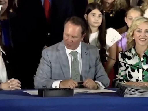 WATCH: Girl Faints Right Behind Louisiana Governor As He Signs Ten Commandments Law