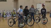 Shots for Tots donates 21 bikes to Liberty students