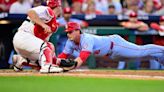 Phillies top Cardinals for their 8th straight home win after Suárez leaves early with an injury