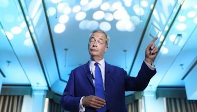 Nigel Farage sings along to Eminem on stage in Blackpool