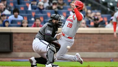 Cardinals go up early, hold off Mets