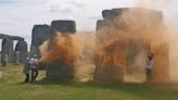 Two eco-activists arrested after Stonehenge sprayed with orange powder