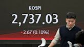 Stock market today: Global shares mostly higher after calm day on Wall St