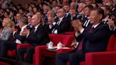 Vladimir Putin and Xi Jinping enjoy live concert during anniversary