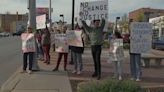 Protestors call for accountability as KC firefighter heads back to work