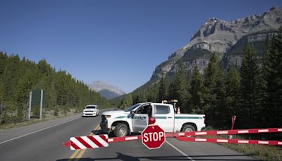 Police going door to door in Jasper after tourists and residents were forced to evacuate overnight