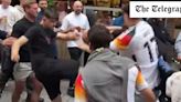 Watch: England fans clash with German supporters after taunting them over Euro 2024 exit