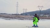 Skier Flies Through Streets On Jetpack