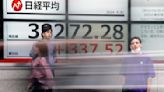 Stock market today: Asian markets wobble after Fed sticks with current interest rates