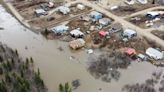 Water receding in Fort McPherson, N.W.T., but access to water, airport still flooded