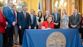 Kim Reynolds signs $100M property tax cut that helps seniors, veterans and limits city revenue growth