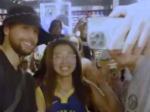 Hilarious moment Steph Curry surprises a fan buying his NBA jersey