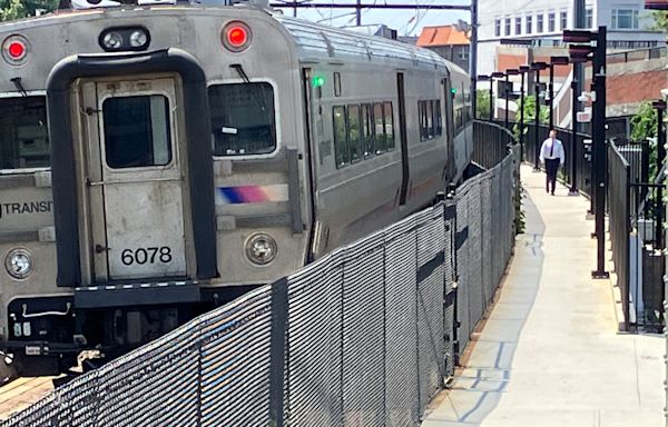 2 injured on overhead signal structures, fall onto NJ Transit tracks, officials say