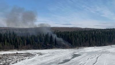 Douglas C-54 plane with 2 people on board crashes into river outside Fairbanks, Alaska