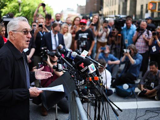 Robert De Niro clashes with Trump supporters outside court