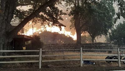 Winds and lightning strikes stoke Oregon fire, now the largest in the U.S.