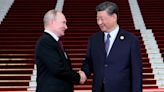 Vladimir Putin meets Xi Jinping at major Chinese summit