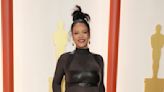 Rihanna shows off baby bump in leather and sheer dress at the 2023 Oscars