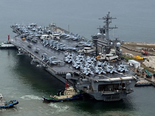 A US Navy aircraft carrier has arrived in South Korea just days after Russia and North Korea signed a defense pact