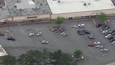 Alleged robbery suspect critically injured after shooting with authorities at DeKalb County shopping center, police say