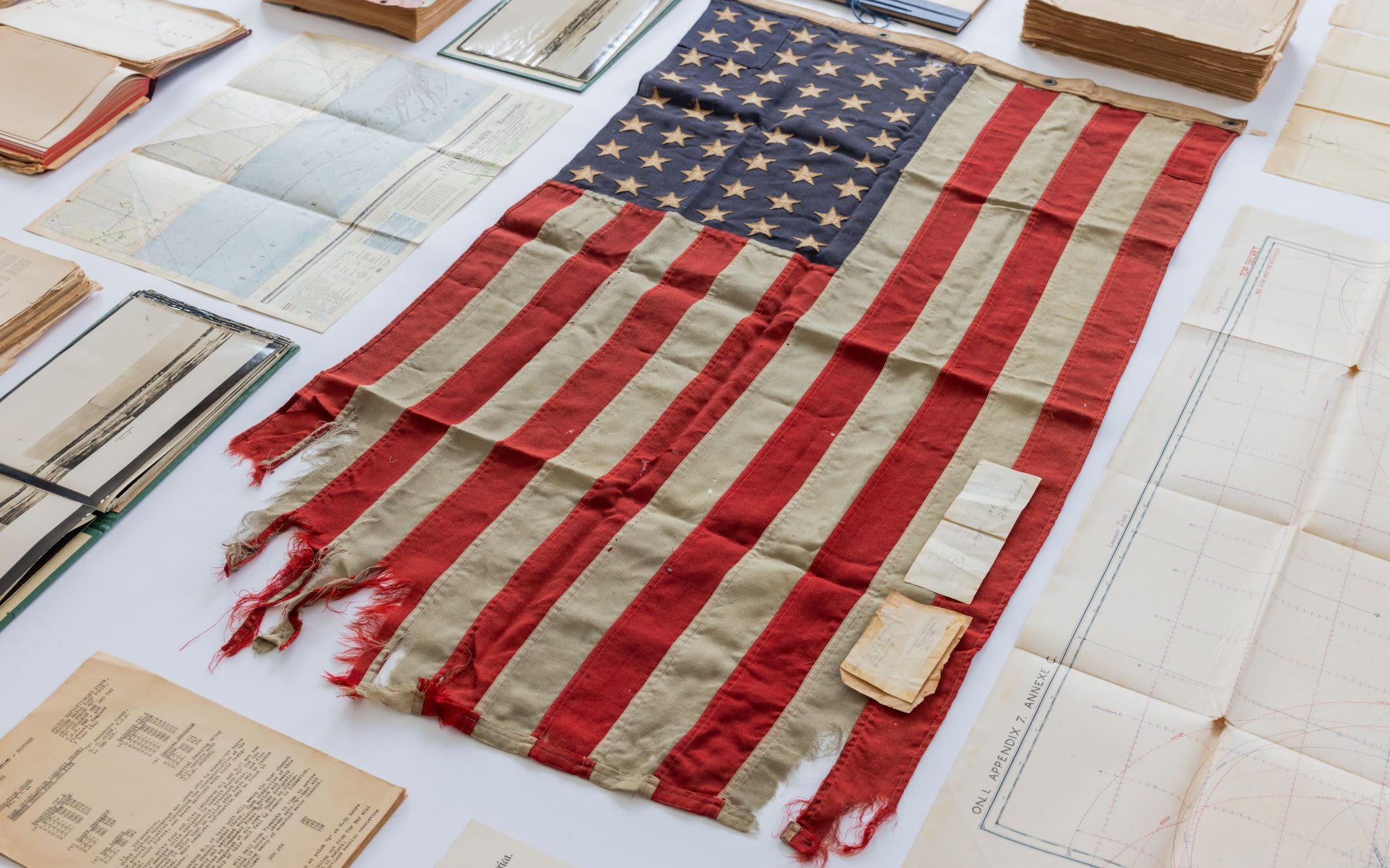 Shrapnel-scarred US flag from D-Day ship on sale