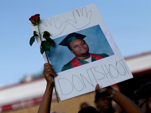 Michael Brown's mom pushes for justice for her son in public hearing