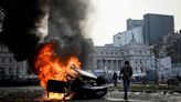 Protesters and police clash in Argentina as Congress debates Milei’s reform bill