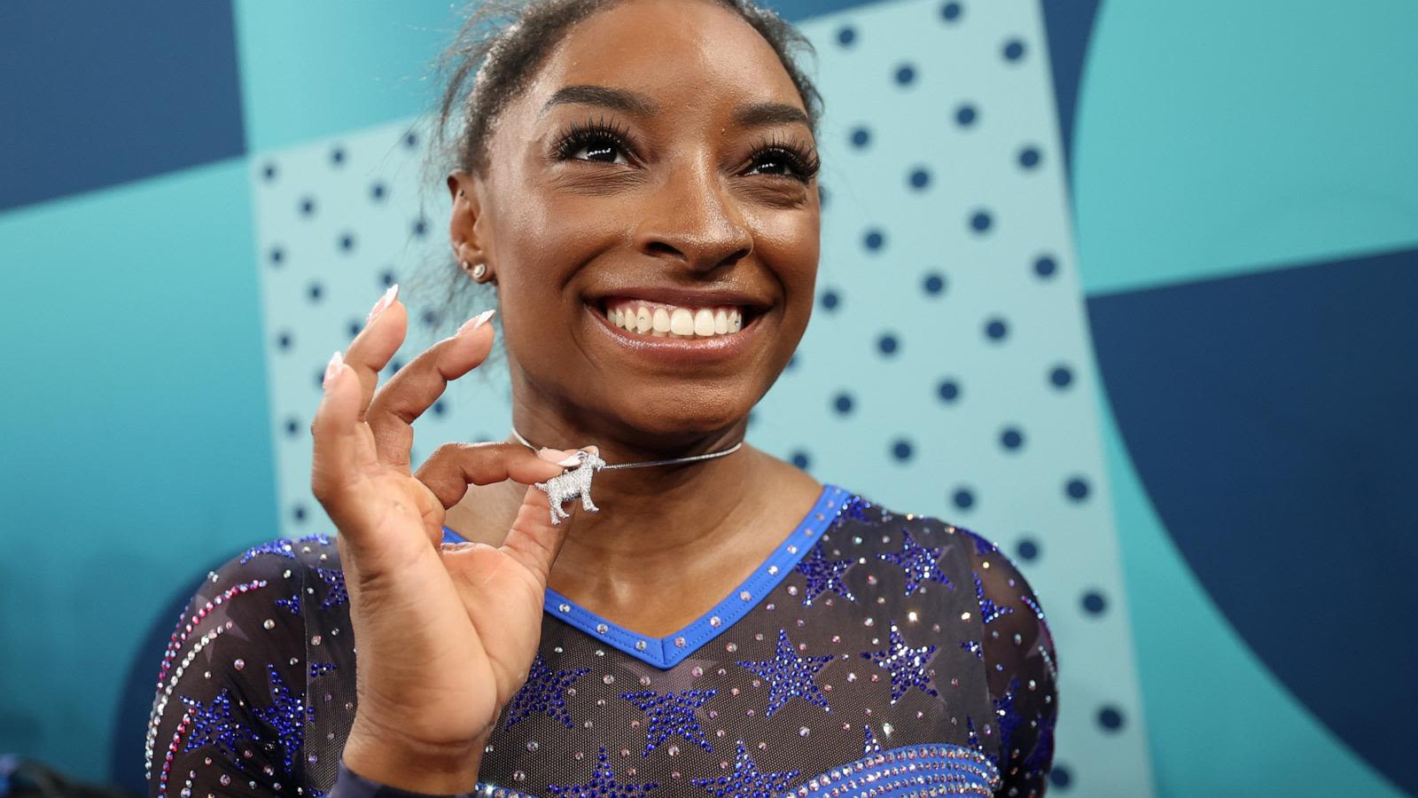 Simone Biles shows off sparkling goat necklace amid historic Olympic gold medal win