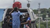 Hundreds flee gang attacks in Haiti capital | Arkansas Democrat Gazette