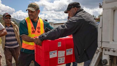 Papua New Guinea landslide survivors slow to move to safer ground after hundreds buried