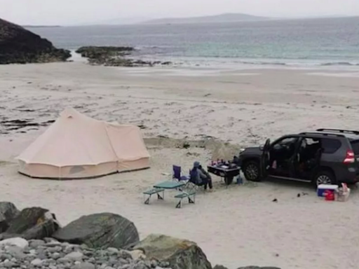 Fury as family set up camp on protected Scots beach despite warnings