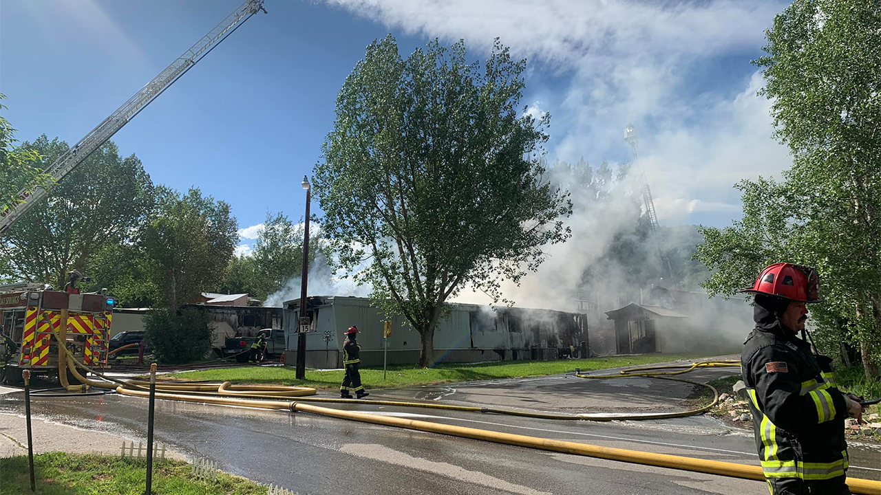 Plane crashes into Colorado mobile home park, setting two trailers ablaze