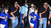 Shah Rukh Khan does his doting dad, loving husband duties right as he returns to Mumbai with his son AbRam and wife Gauri Khan: WATCH