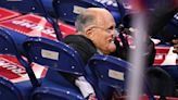 Rudy Giuliani Crashes Into Empty Chairs After Bizarre Fall At RNC