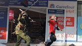 Kenyan president withdraws tax bill after violent protests leave 23 dead