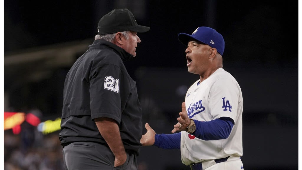 Dodgers blow lead, Phillies score 5 after questionable call at third base