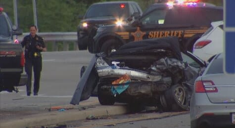Man dies in crash caused by vehicle in pursuit; woman facing charges