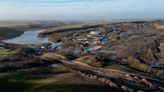 Toxic landslide threatens Danish village as argument over clean up costs escalates