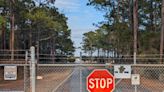 What's the future of the Coast Guard's 210-acre LORAN station site near Carolina Beach?