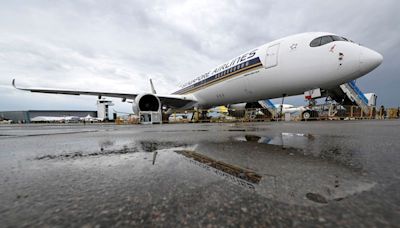 Singapore Airlines posts record annual profit, flags challenging macro